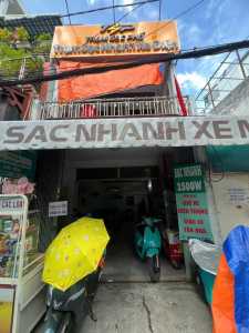 Cần sang lại Mô hình quán cà phê _ kết hợp trạm sạc xe điện Xanh